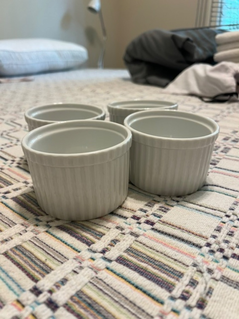 Set of four white Crate & Barrel Ramekins